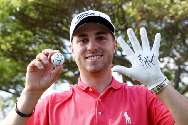 Justin Thomas celebrates after his history-making effort in the opening round of the Sony Open in Hawaii. Picture: Getty Images