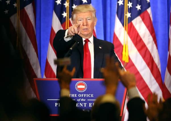 Donald Trump takes a question at his first news conference since the election at Trump Tower in New York. Picture: Spencer Platt/Getty