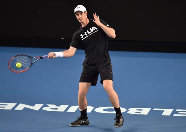 Andy Murray hits a return during a practice session ahead of the Australian Open in Melbourne. Picture: Paul Crock/AFP/Getty Images