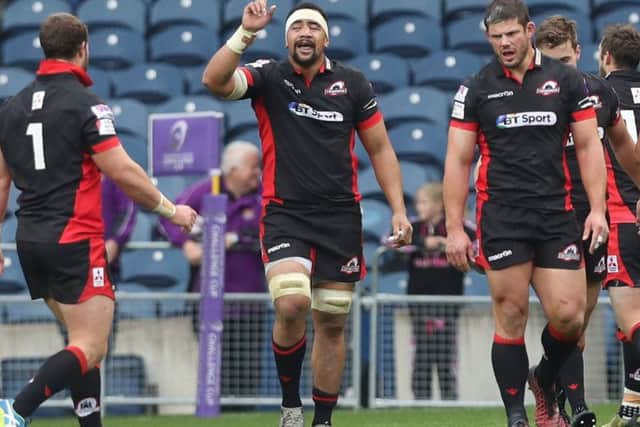 Nasi Manu celebrates scoring a try in Edinburghs 36-35 victory over Harlequins  last October. Picture: Getty