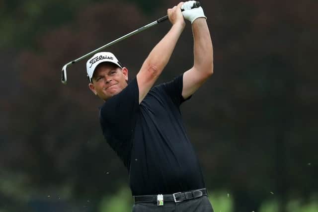 Scotland's David Drysdale hits his second shot on the 16th hole during day two of The BMW South African Open. Picture: Warren Little/Getty Images