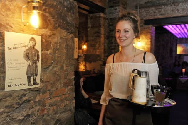 Rea Kenkel busy serving Ales and Wines of the Seven Kingdoms. Picture: JP License