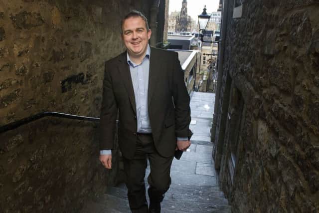 Edinburgh City manager Gary Jardine walks up Advocate's Close on his way to his day job at Edinburgh City Council. Picture Ian Rutherford