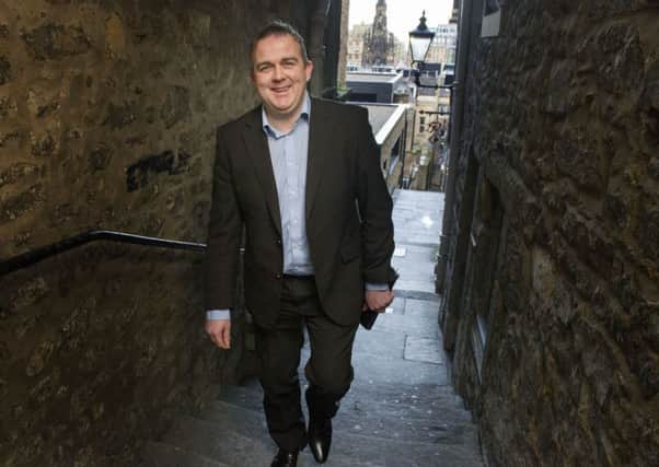 Edinburgh City manager 
Gary Jardine walks up Advocate's Close on his way to his day job at Edinburgh City Council. Picture Ian Rutherford