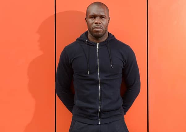 Christian Nade is relishing the prospect of crossing swords with Hibs again when they visit Dumbarton on Saturday. Picture: Neil Hanna