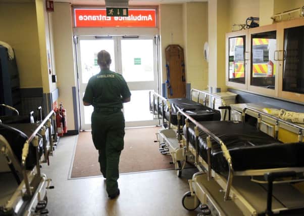 An ambulance worker in the accident and emergency department at Edinburgh Royal Infirmary. Picture: Greg Macvean
