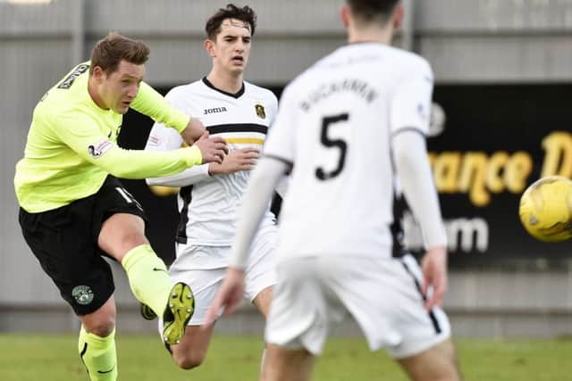 On-loan Kris Commons, at the heart of everything Hibs did, fires a shot at goal in the victory over Dumbarton. 
Picture: Rob Casey/SNS