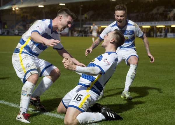 Morton's Lawrence Shankland, centre, who is on loan from Aberdeen, celebrates his goal with his team-mates. Picture: Craig Foy/SNS
