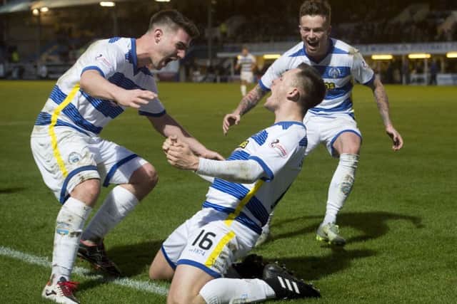 Morton's Lawrence Shankland, centre, who is on loan from Aberdeen, celebrates his goal with his team-mates. Picture: Craig Foy/SNS