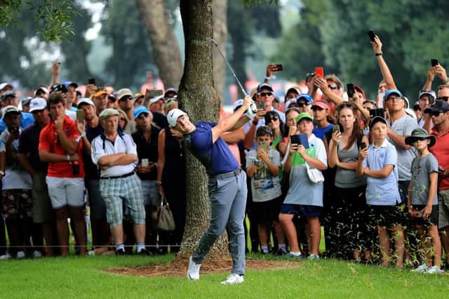 Rory McIlroy hits his second shot on the first hole during day three of the BMW SA Open. Picture: David Cannon/Getty Images