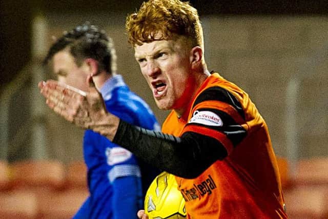 Simon Murray celebrates drawing the scores level at 3-3 with a minute left. Picture: Sammy Turner/SNS