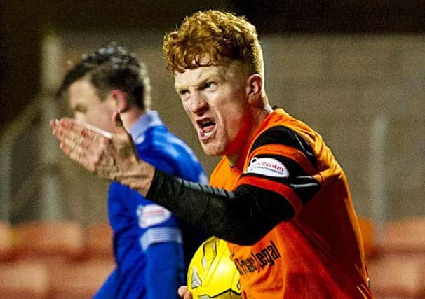 Simon Murray celebrates drawing the scores level at 3-3 with a minute left. Picture: Sammy Turner/SNS