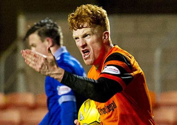 Simon Murray celebrates drawing the scores level at 3-3 with a minute left.  Picture: Sammy Turner/SNS
