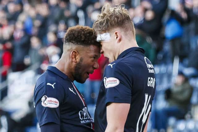Falkirk's Peter Grant, right, celebrates with Miles Hippolyte after scoring the equaliser. Picture: Roddy Scott/SNS