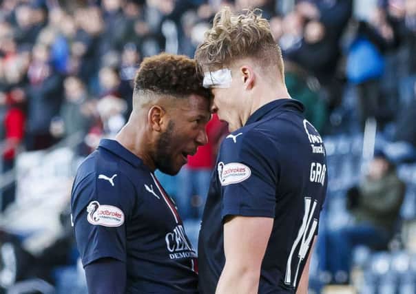 Falkirk's Peter Grant, right, celebrates with Miles Hippolyte after scoring the equaliser. Picture: Roddy Scott/SNS