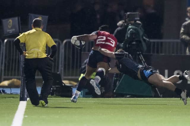 Munster's Francis Saili scores the winning try