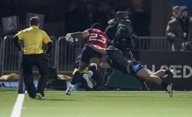 Munster's Francis Saili scores the winning try