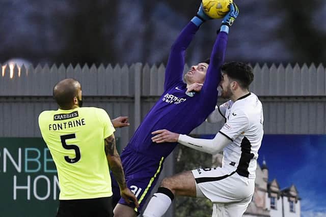 Ross Laidlaw clutches a high ball as he keeps a clean sheet during Hibernians victory at Dumbarton. Picture: SNS.