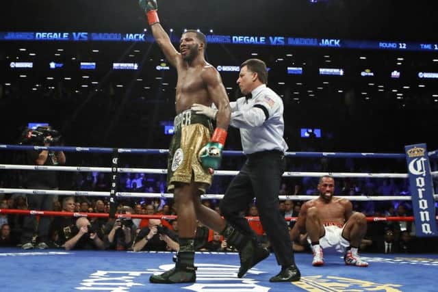 Badou Jack celebrates after knocking down James DeGale during the 12th round  in New York. Picture: AP.
