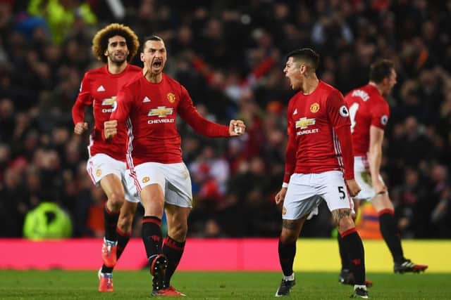 Zlatan Ibrahimovic celebrates with team mates after equalising for Manchester United. Picture: Getty