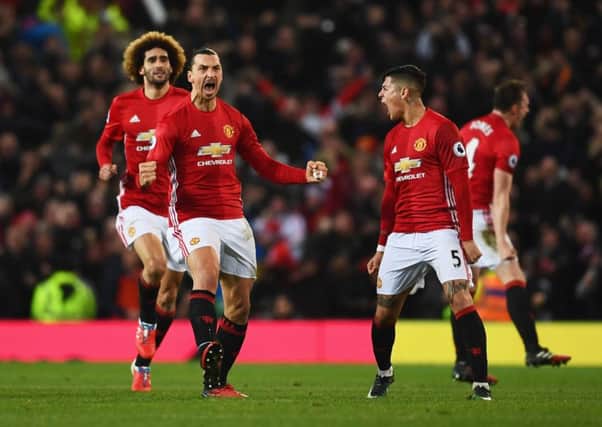 Zlatan Ibrahimovic celebrates with team mates after equalising for Manchester United. Picture: Getty