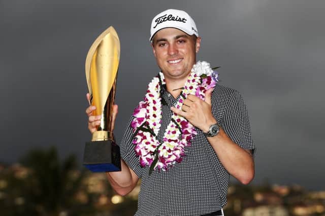 Justin Thomas celebrates his record-breaking win in the Sony Open in Hawaii. Picture: Getty Images