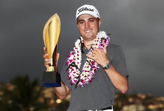 Justin Thomas celebrates his record-breaking win in the Sony Open in Hawaii. Picture: Getty Images