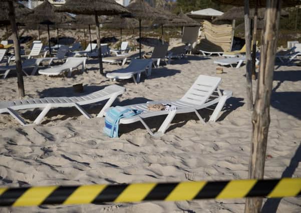 A picture taken on June 27, 2015, shows the cordoned-off beach in the aftermath of a shooting attack. (Picture: AFP/Getty Images)