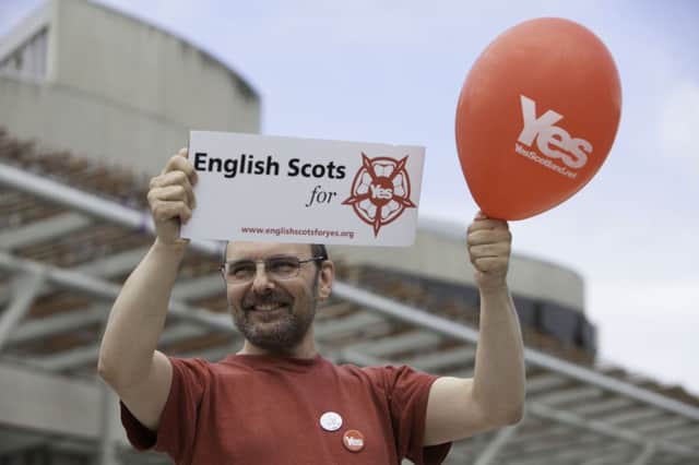 Steve Smith, from County Durham, a member of English Scots for Yes, campaigns outside the Scottish Parliament in 2014. Picture: Toby Williams
