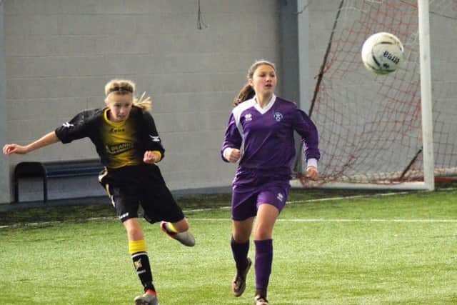 West, in purple, defeated North 2-1 at Toryglen. Picture: Grenville Dawson.