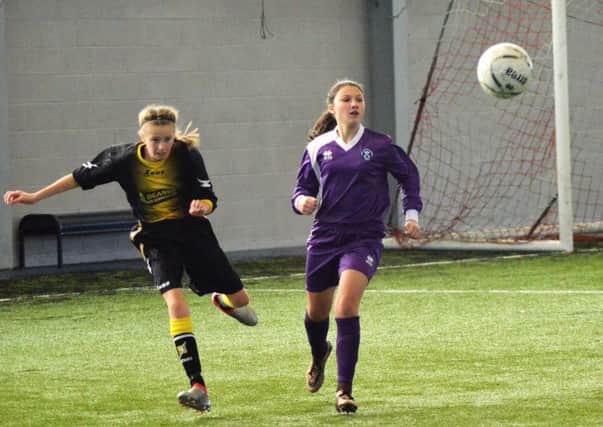 West, in purple, defeated North 2-1 at Toryglen. Picture: Grenville Dawson.