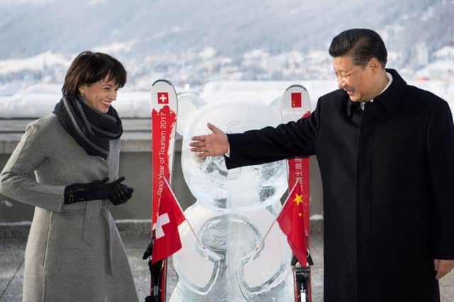 Swiss president Doris Leuthard and Chinas president Xi Jinping. Picture: AFP/Getty Images