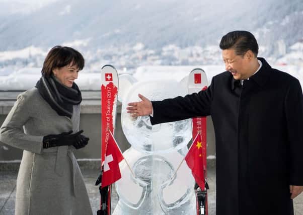Swiss president Doris Leuthard and Chinas president Xi Jinping. Picture: AFP/Getty Images