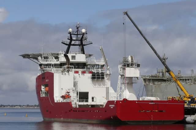 Australian navy ship Ocean Shield lies docked at naval base HMAS Stirling while being fitted with a towed pinger locator to aid in her roll in the search for missing Malaysia Airlines Flight MH370 in Perth, Australia (AP Photo/Rob Griffith, File)