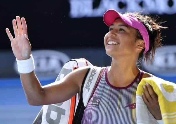 Britain's Heather Watson waves after defeating Australia's Samantha Stosur. Picture: Andy Brownbill/AP