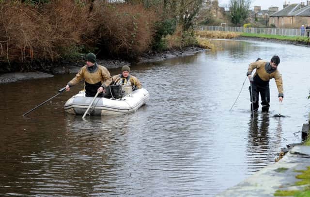 Electro-fishing to remove fish from the Union Canal in Linlithgow today. Picture: Lisa Ferguson