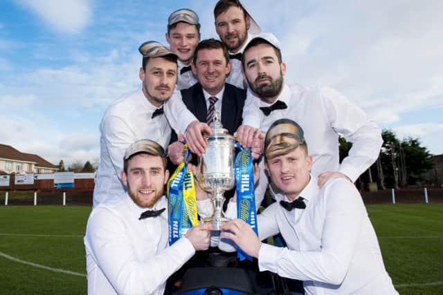 Bonnyrigg Rose players get their hands on the Scottish Cup during their 'James Bond' photoshoot. Picture: SNS.
