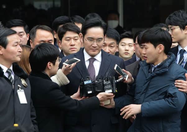 Vice chairman of Samsung Lee Jae-Yong leaves after attending a court hearing at the Seoul Central District Court. Picture: Getty Images