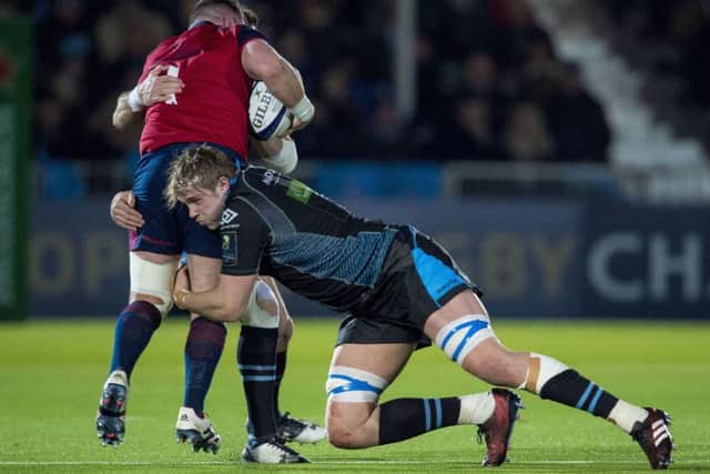 Jonny Gray makes a tackle during Glasgow's European Champions Cup defeat by Munster. Picture: SNS Group