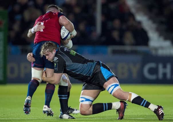 Jonny Gray makes a tackle during Glasgow's European Champions Cup defeat by Munster. Picture: SNS Group