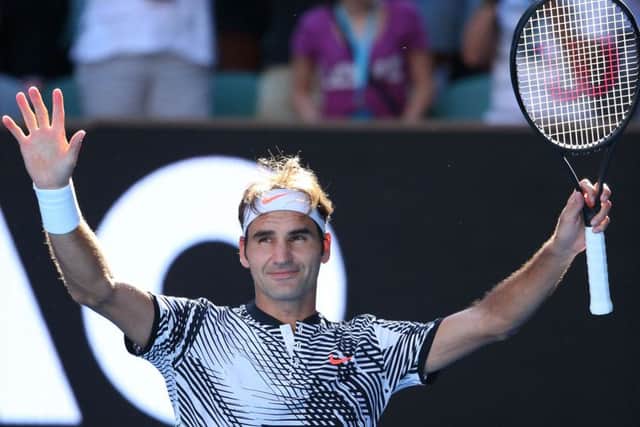 Roger Federer celebrates his second round win over Noah Rubin on day three of the Australian Open. Picture: Michael Dodge/Getty Images
