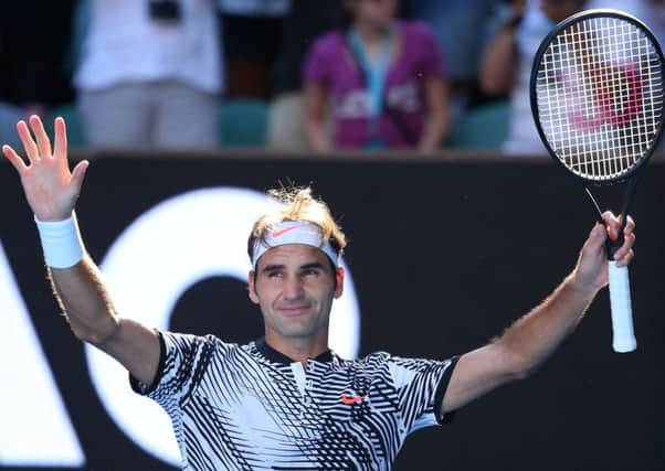 Roger Federer celebrates his second round win over Noah Rubin on day three of the Australian Open. Picture: Michael Dodge/Getty Images