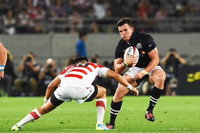 Scotland's Matt Scott in action against Japan's Yu Tamura. Picture: Gary Hutchison/SNS/SRU