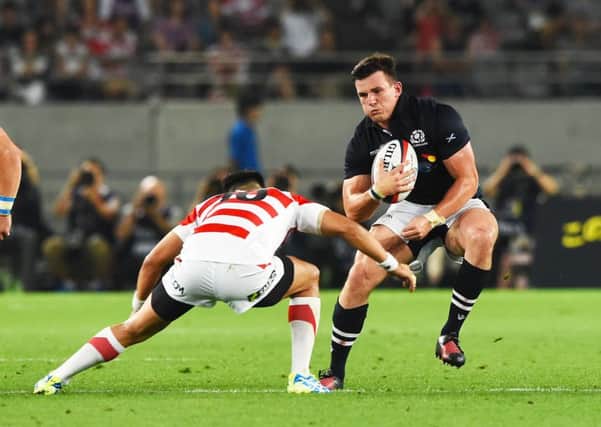 Scotland's Matt Scott in action against Japan's Yu Tamura. Picture: Gary Hutchison/SNS/SRU
