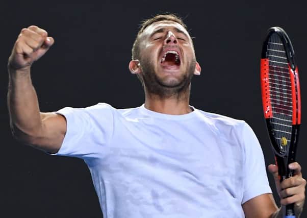 Dan Evans celebrates his victory against Croatia's Marin Cilic. Picture: AFP/Getty Images