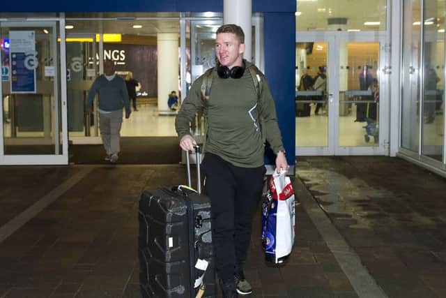 Jonny Hayes arrives back from Aberdeen's training camp in Dubai. Picture: SNS