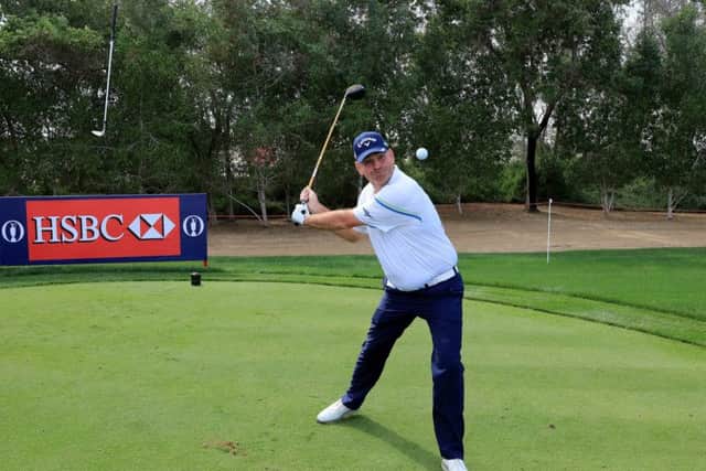 Thomas Bjorn attempts a trick shot on the Teebox Take Over Challenge during the pro-am for the 2017 Abu Dhabi HSBC Golf Championship at Abu Dhabi Golf Club yesterday. Bjorn, Europe's Ryder Cup skipper, will have an extra wild card pick for the 2018 contest in France. Picture: David Cannon/Getty