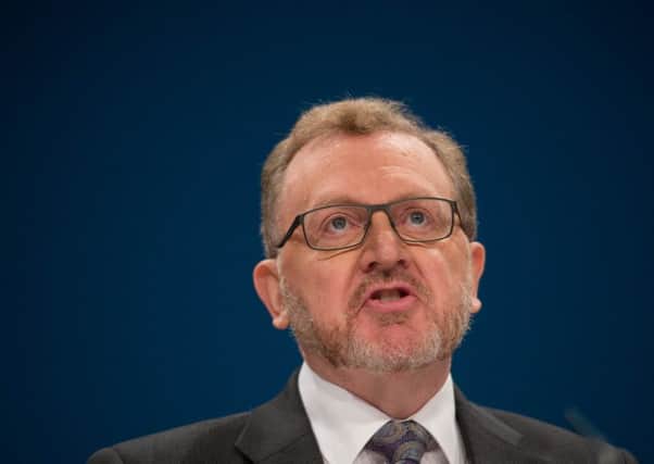 Scottish Secretary David Mundell has signalled that Holyrood will not lose any of its devolved powers. Picture: PA Wire