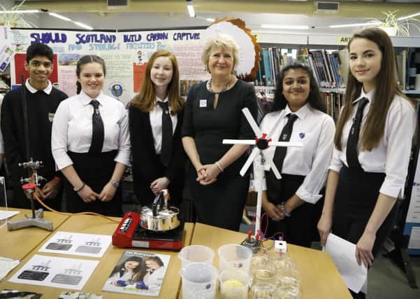 Environment secretary Roseanna Cunningham meets pupils studying climate change at Currie Community High School in Edinburgh.