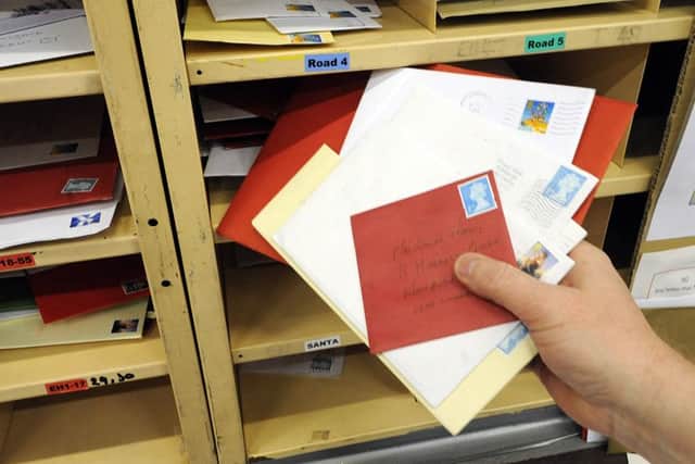 A drop in letter volumes offset a stronger performance from Royal Mail's parcels business. Picture: Julie Bull